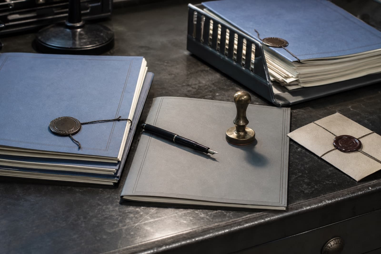 Sample image of an export permit desk with blank documents and stamp